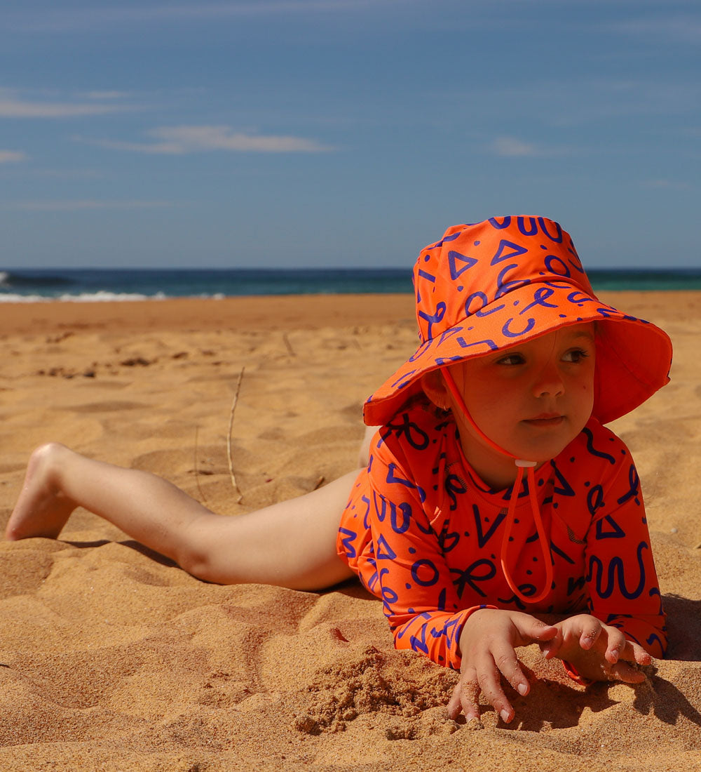 Kids Reversible Swim Hat - Orange/Squiggle Pop Print